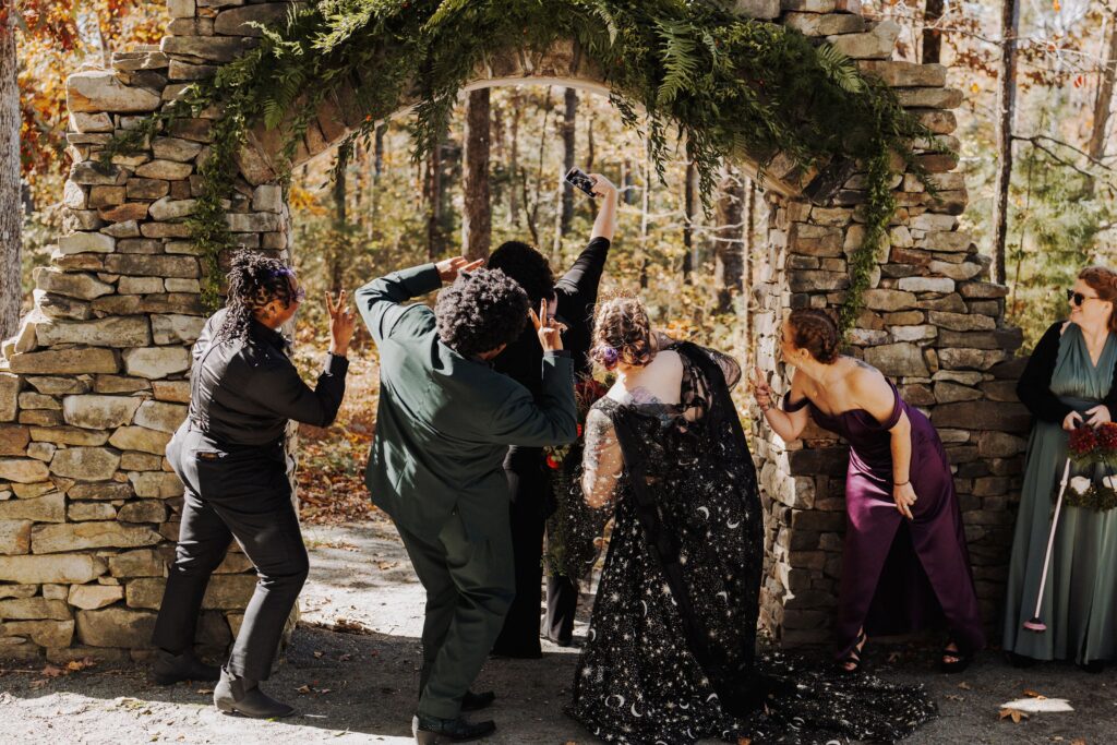 Starlight Meadow wedding ceremony under the stone arch