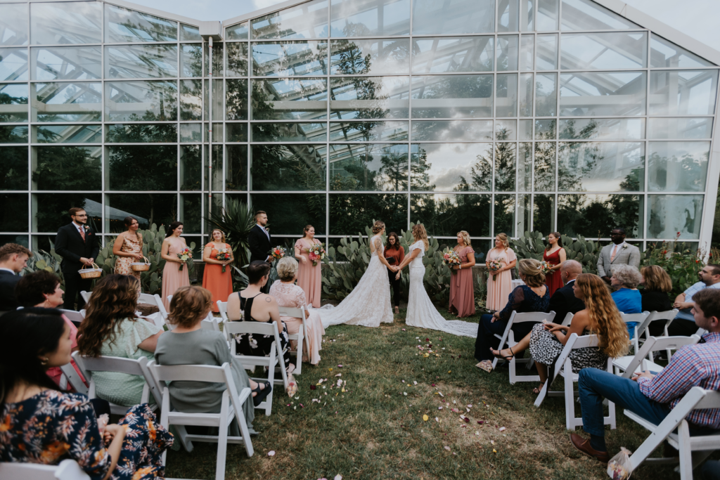 Hannah & Blakeley's outdoor ceremony beside the Butterfly House.